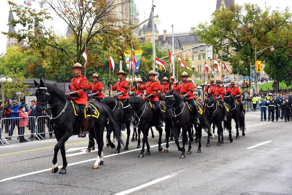 The Royal Canadian Mounted Police is Canada's national police force famous for riding horses and their scarlet uniforms